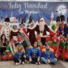 Papá Noel llega a La Marina y recibe a los niños y las niñas de la pedanía ilicitana